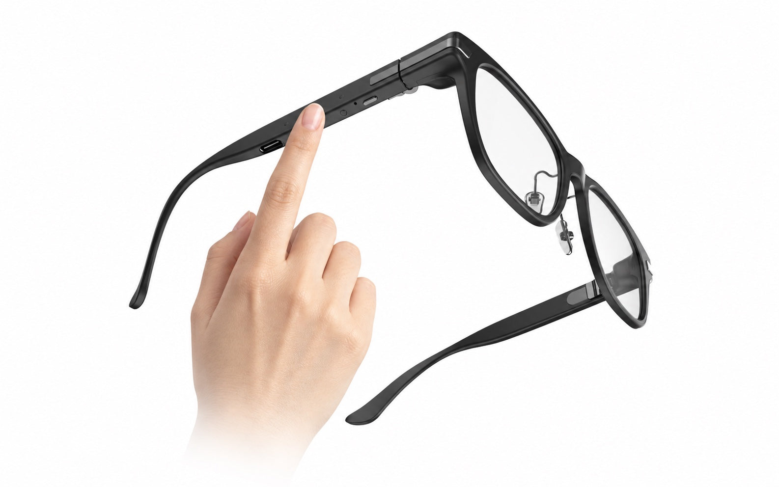 Hand demonstrating the temple touch area on the AR99 reference frame